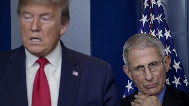 Then US president Donald Trump wanted his top Covid-19 expert, Anthony Fauci, right, to explain himself over funding links to the Wuhan laboratory suspected of leaking the coronavirus. Picture: Getty Images