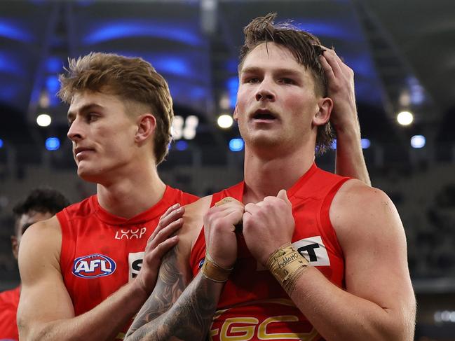 Will Graham and Bailey Humphrey after Gold Coast’s loss to West Coast. Picture: Will Russell/AFL Photos via Getty Images