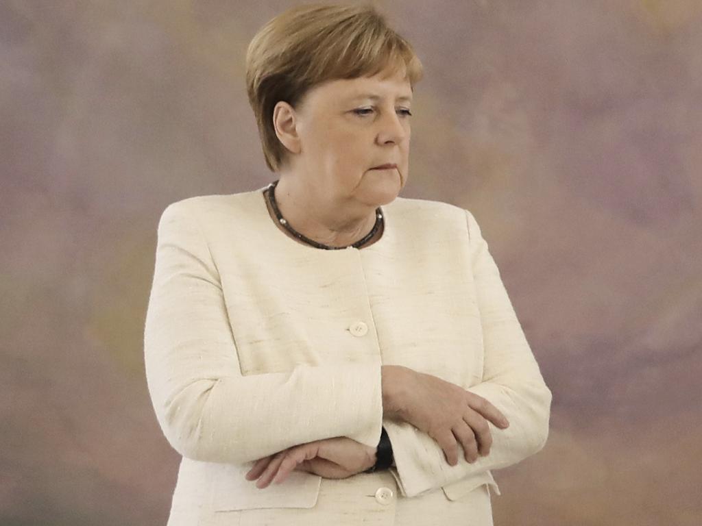 Chancellor Angela Merkel (CDU) spotted shaking uncontrollably for the second time on June 27 in Berlin. Picture: AP