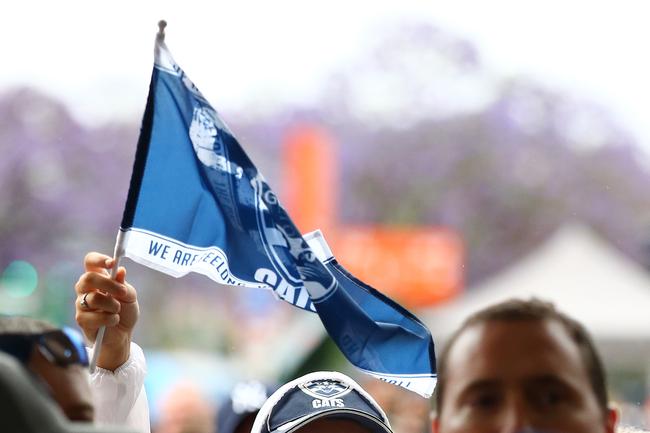 BRISBANE, AUSTRALIA - OCTOBER 24: Cats fans arrive to the gate before the 2020 AFL Grand Final match between the Richmond Tigers and the Geelong Cats at The Gabba on October 24, 2020 in Brisbane, Australia. (Photo by Jono Searle/AFL Photos/via Getty Images)