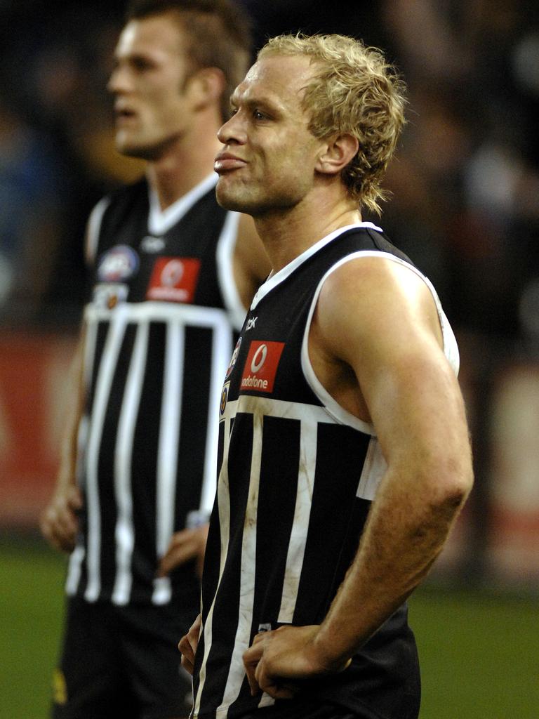 Chad Cornes wearing the prison bars during an AFL game in 2007.