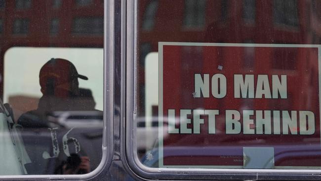 A sign in the window of a bus carrying Trump supporters outside the DC Central Detention Facility in Washington, DC. Picture: Getty Images via AFP