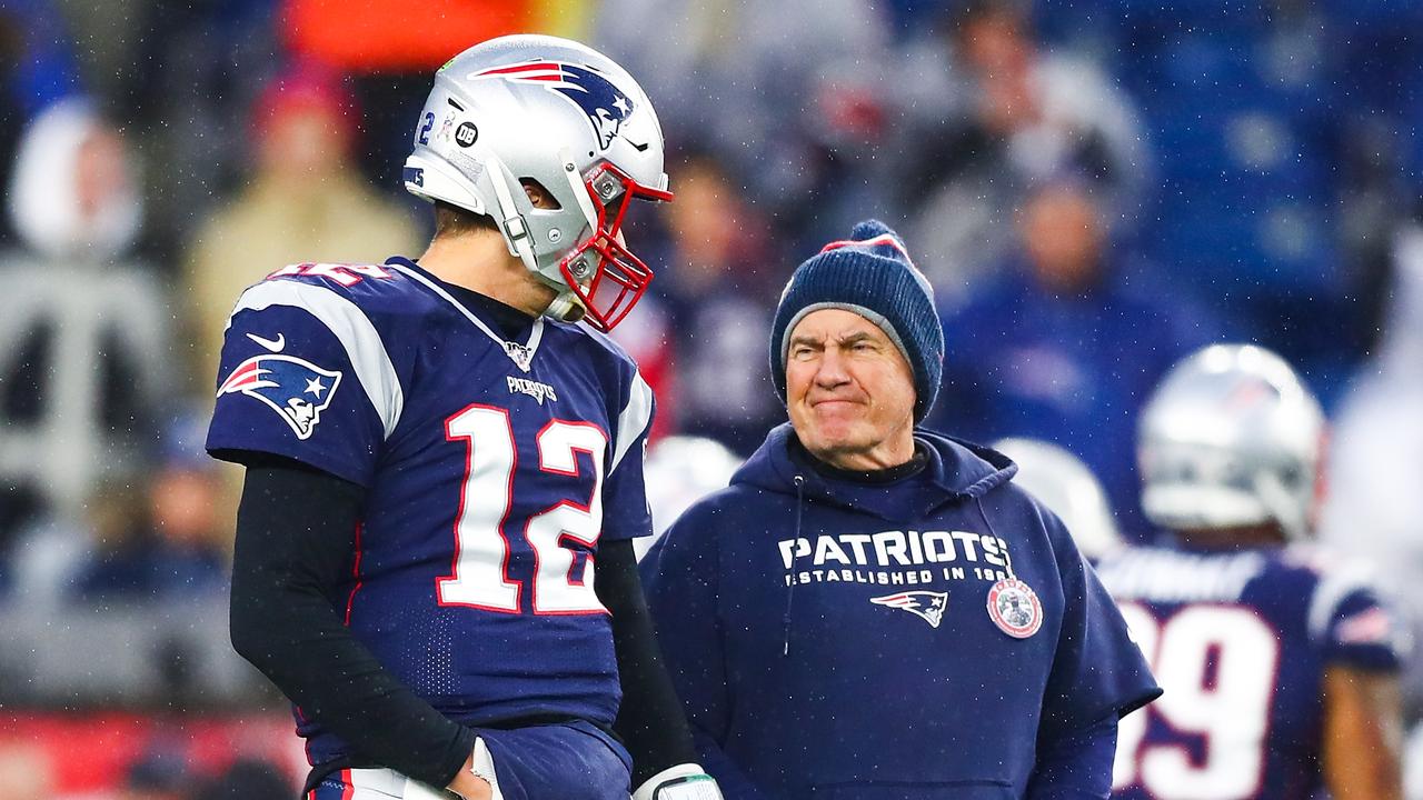 FOXBOROUGH, MA - NOVEMBER 24: Tom Brady #12 talks to head coach Bill Belichick of the New England Patriots before a game against the Dallas Cowboys at Gillette Stadium on November 24, 2019 in Foxborough, Massachusetts. (Photo by Adam Glanzman/Getty Images)
