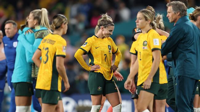 Australia players look dejected after the team's 1-3 defeat