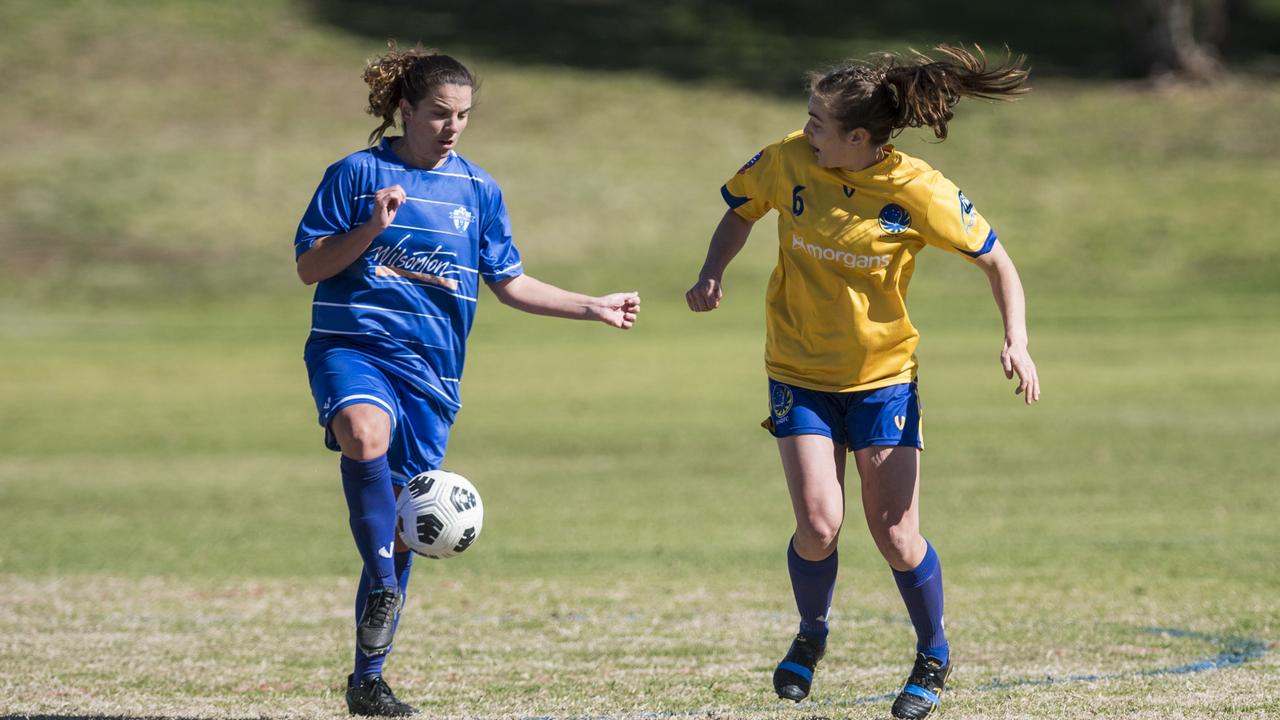 Sarah Sheridan (left) of Rockville Rovers and Brook Anderson of USQ FC in Toowoomba Football League Premier Women round 14 at Captain Cook ovals, Sunday, July 18, 2021. Picture: Kevin Farmer