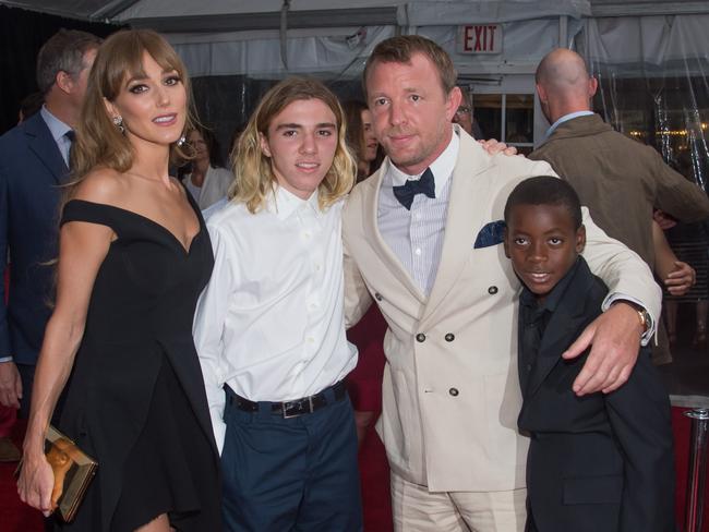 Guy Ritchie, second from right, with his wife Jacqui Ainsley and his two sons with ex-wife Madonna, Rocco Ritchie, secopnd from left, and David Ciccone Ritchie in 2015.  Picture:  Supplied