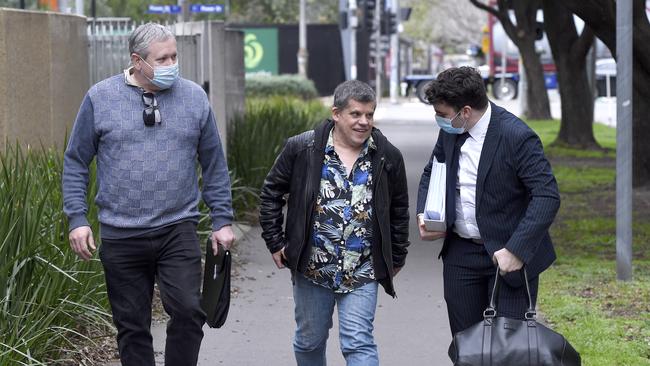 Maria James’s sons Mark James and Adam James (left and middle), pictured with their legal representative, are hoping a coronial inquest could finally give them answers about their mother’s murder 41 years after she was killed. Picture: NCA NewsWire / Andrew Henshaw