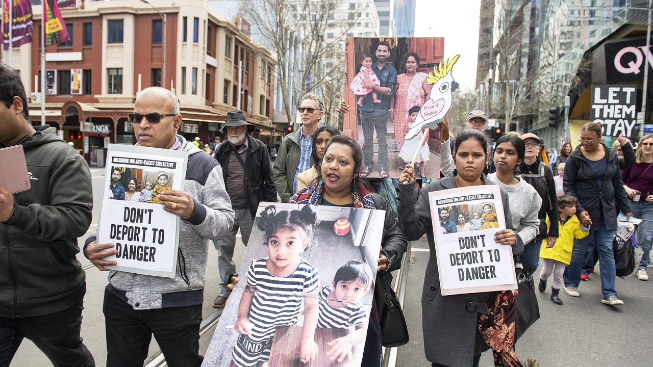 Crowds in Melbourne have rallied, calling on the government to let a family of asylum seekers stay. Picture: AAP Image/Ellen Smith.