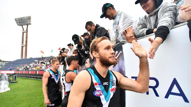 Jack Hombsch of the Power celebrates with the small crowd after the match at Jiangwan Stadium in Shanghai, China. Picture: AAP Image/David Mariuz