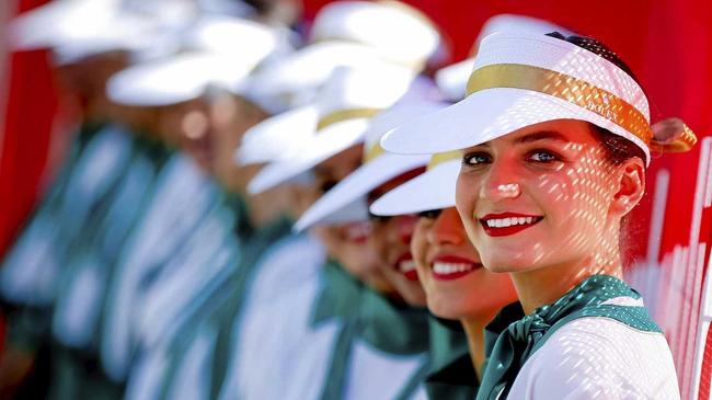 Grid girls pose on the track before the start of the Australian Formula One Grand Prix at the Albert Park circuit in Melbourne, Australia, on March 20, 2016. EPA/DIEGO AZUBEL. Picture: DIEGO AZUBEL