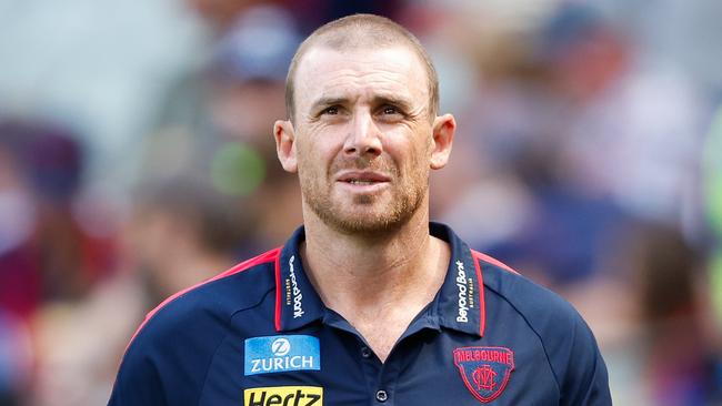 MELBOURNE, AUSTRALIA - MARCH 17: Simon Goodwin, Senior Coach of the Demons looks on at half time during the 2024 AFL Round 01 match between the Melbourne Demons and the Western Bulldogs at the Melbourne Cricket Ground on March 17, 2024 in Melbourne, Australia. (Photo by Dylan Burns/AFL Photos via Getty Images)