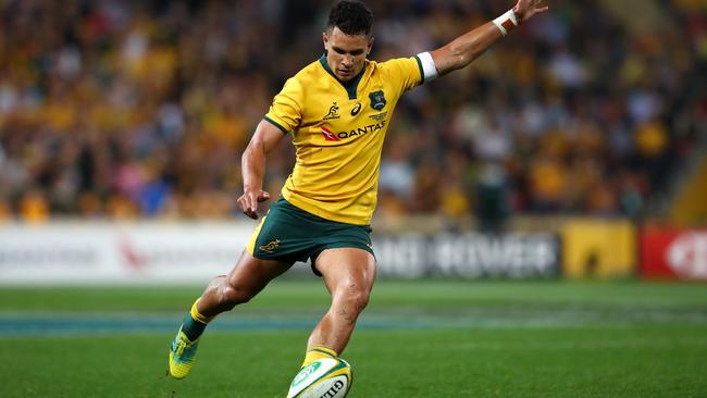 Matt Toomua of the Wallabies kicks for goal at Suncorp Stadium.