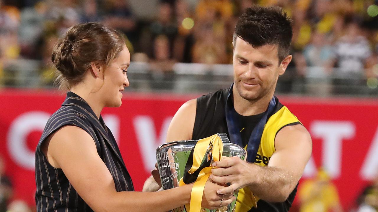 Ash Barty hands over the cup to Trent Cotchin in 2020. Picture : Michael Klein