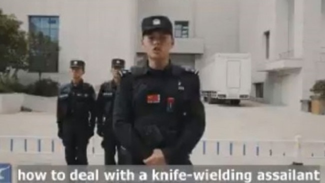 Viral video by police in China show how to survive knife attack by ...