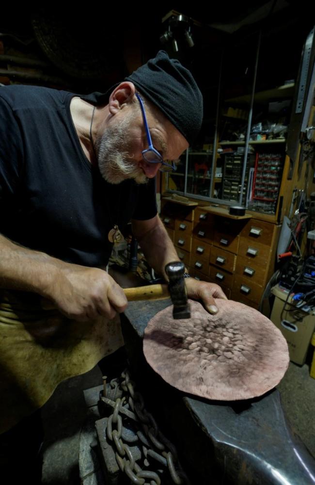 The copper smith (Herbert R. Bauer) producing a replica of the Nebra Sky Disc by helical hammer forging (c) State Office for Heritage management and Archaeology, Saxony-Anhalt—State Museum of Prehistory. Picture: J. Lipták, Munich