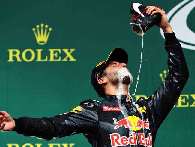 That was a first! Daniel Ricciardo introduces the ‘shoey’ on the podium during the Formula One Grand Prix of Germany. Picture: Getty