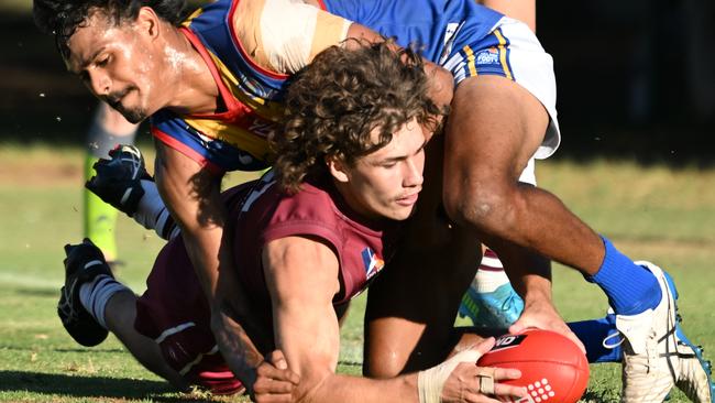 PAOC’s Josh Garrels battles Domenic Grant for the footy on Saturday. Picture: Morgan Sette