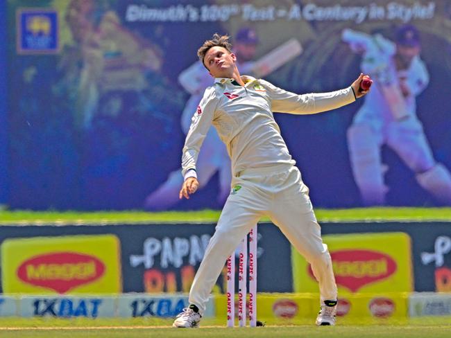 Australia's Matthew Kuhnemann bowls during the series against Sri Lanka. Picture: AFP