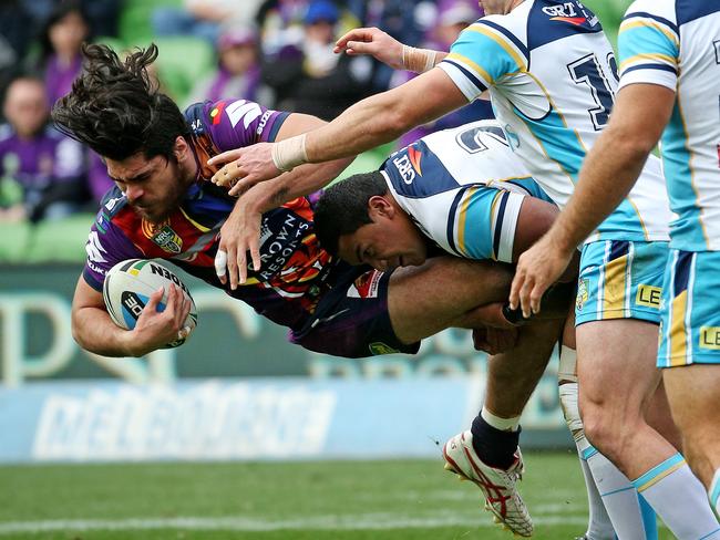 Hala (right) drives Melbourne’s Tohu Harris into the ground in 2015. Picture: Colleen Petch