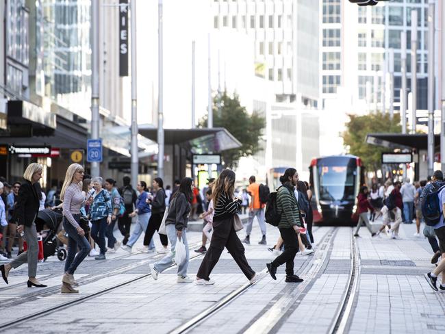 Workers in Sydney’s George Street. Picture: NCA NewsWire / Monique Harmer