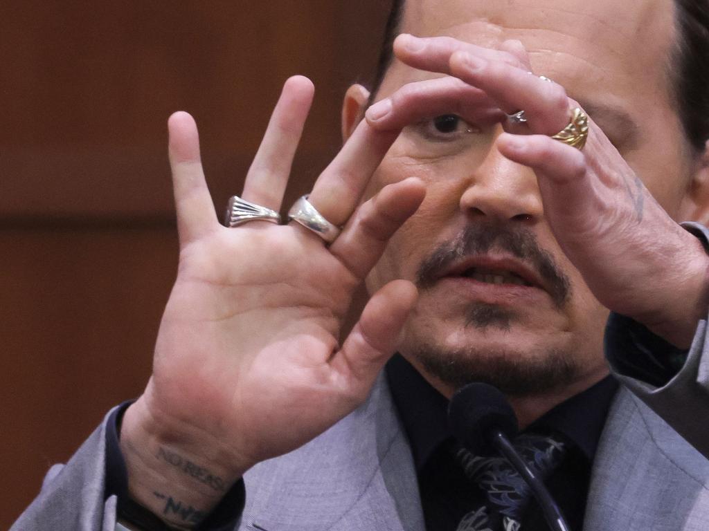 Johnny Depp displays his middle finger in court last month. Picture: AFP