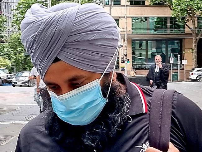 MELBOURNE, AUSTRALIA - NCA NewsWire Photos - 18 DECEMBER, 2023: Jatinder Singh (right) leaves the County Court of Victoria after pleading guilty to the theft of more than $6m mistakenly refunded from a cryptocurrency website Crypto.com in May 2021. Picture: NCA NewsWire /  Liam Beatty