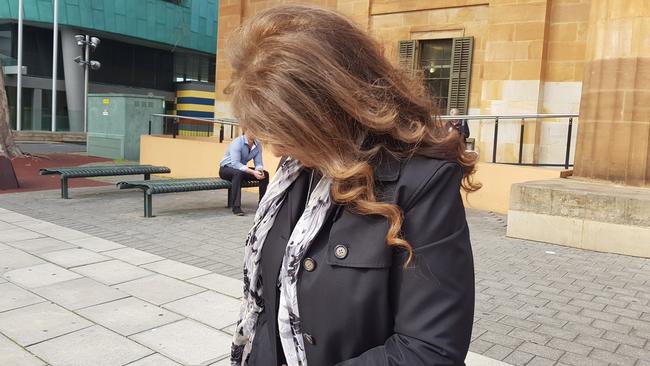 Ibtisam Dimachki outside the Adelaide Magistrates Court, where has been sentenced for bribery offences. Picture: Sean Fewster