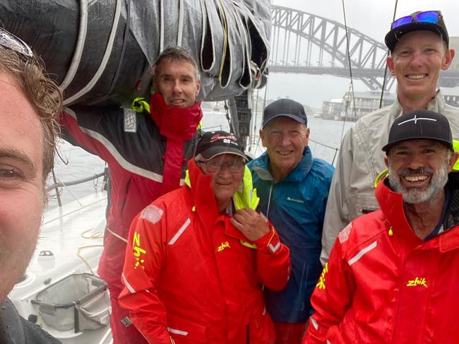 The Tasmanian-based owner and crew of yacht Alive, a previous Sydney to Hobart handicap winner, flew to Sydney on December 19 to sail their boat back to Hobart after tough new border restrictions before the famous annual race could be cancelled. Left to right: Sam Tiedemann (half a head), Robert Carter, David Chadwick, Phil Watkins, Luke Watkins and Duncan Hine.