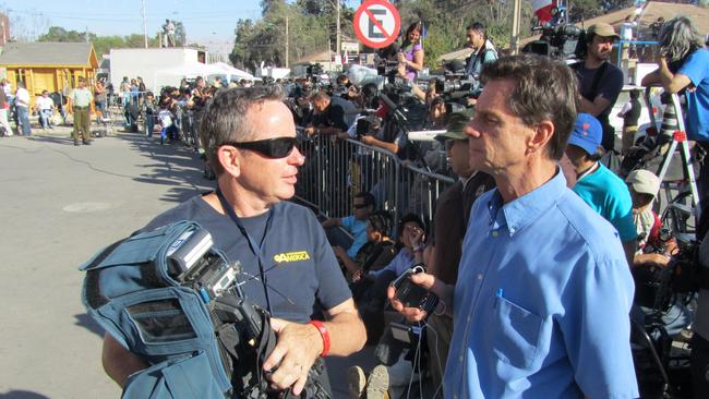  Nine Network cameraman Richard Moran and correspondent Robert Penfold at work covering the mining rescue in Chile. 