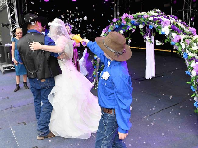 Simone Ward and Geoffrey Borninkhof, were married on The Hill Stage at Gympie Music Muster. Picture: Patrick Woods.