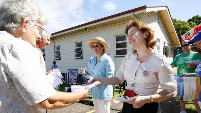 Ipswich Rachel Nolan hands out how to vote cards during the 2021