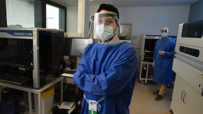 SA Pathology virologist Terry Anninos, (left) head of unit, molecular diagnostics, and Mark Turra, head of public health and epidemiology, who are involved with COVID-19 testing in the laboratory in SA Pathology lab at Royal Adelaide Hospital. Picture: Naomi Jellicoe