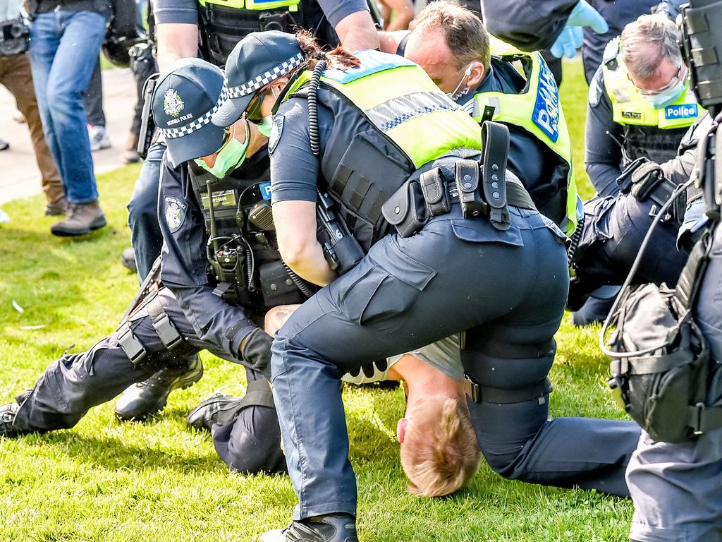 Freedom Day protest - Shrine of Remembrance. Anti Covid-19 / lockdown protesters rally at the Shrine of Remembrance. Protesters are restrained after an altercation with police. Picture: Jake Nowakowski