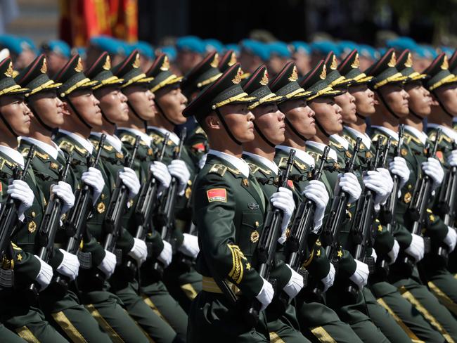 Soldiers from China's People's Liberation Army march on Red Square during a military parade. Picture: AFP