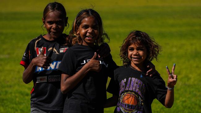 Melbourne Demons players Shane McAdam and Andy Moniz-Wakefield went to Santa Teresa ahead of the 2025 AFL game in Alice Springs. Picture: Melbourne Demons