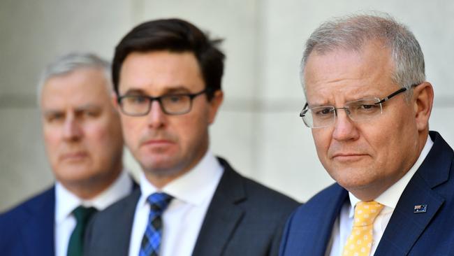 Deputy Prime Minister Michael McCormack, Minister for Water Resources David Littleproud and Prime Minister Scott Morrison at Parliament House in Canberra on Thursday. Picture: AAP