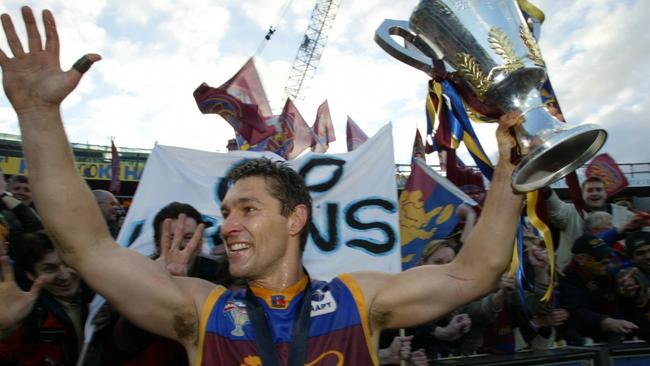 Brisbane's Alastair Lynch celebrates with the fans during the victory lap after the AFL Grand Final Brisbane Vs Collingwood.