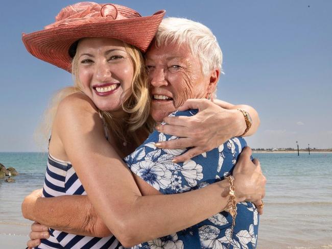 Eve Kheir (hat) who was saved from drowning after being spotted by Sue Williams 73, a resident in nearby Marina Pier at Glenelg. 3rd February 2025 Picture: Brett Hartwig