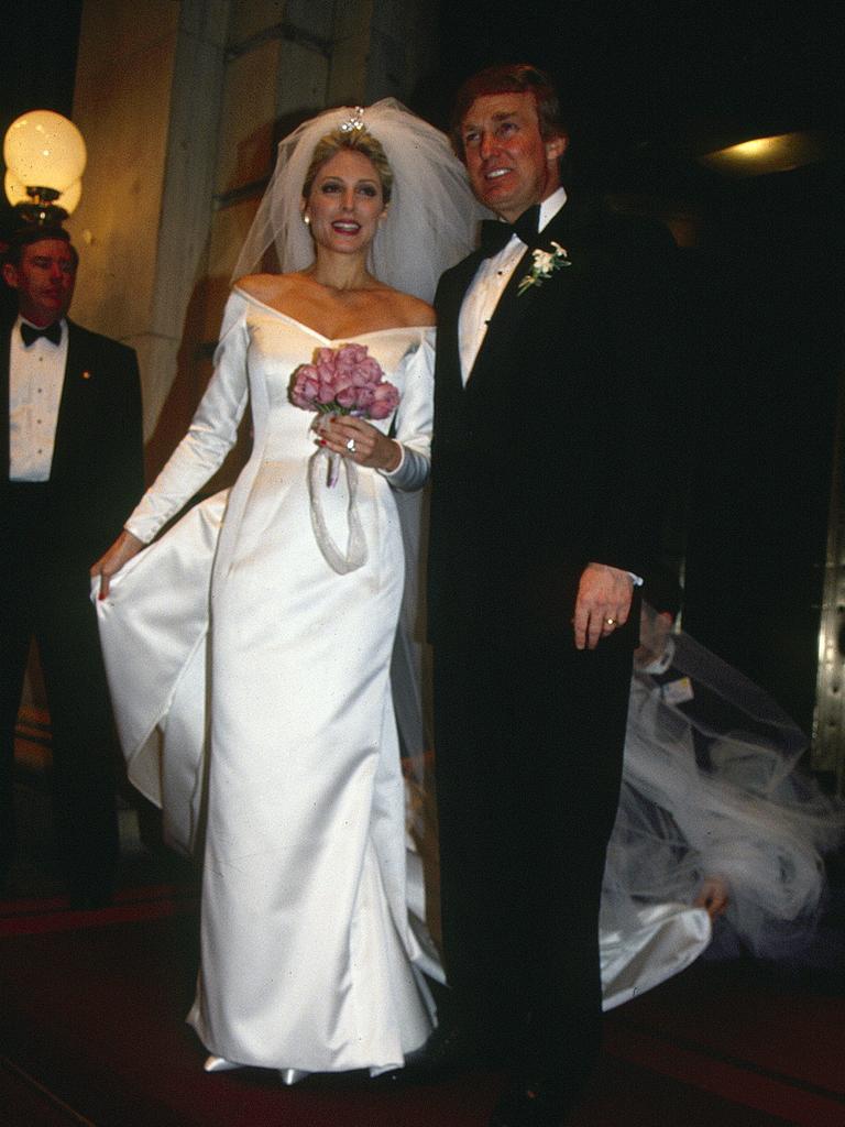 Newly married couple Marla Maples and Donald Trump take the stage at Trump’s Plaza Hotel in New York on December 19, 1993. Picture: Rose Hartman/Getty Images