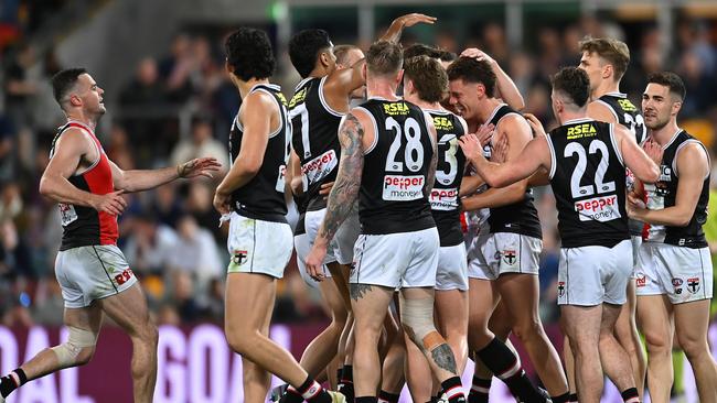 The Saints celebrate a Jack Hayes goal in his first game since round 5 last year. Picture: Albert Perez/AFL Photos