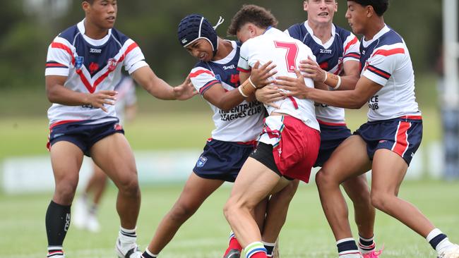 Jack Dean-Potaka defending for the Central Coast Roosters against the Monaro Colts in round one of the Andrew Johns Cup. Picture: Sue Graham