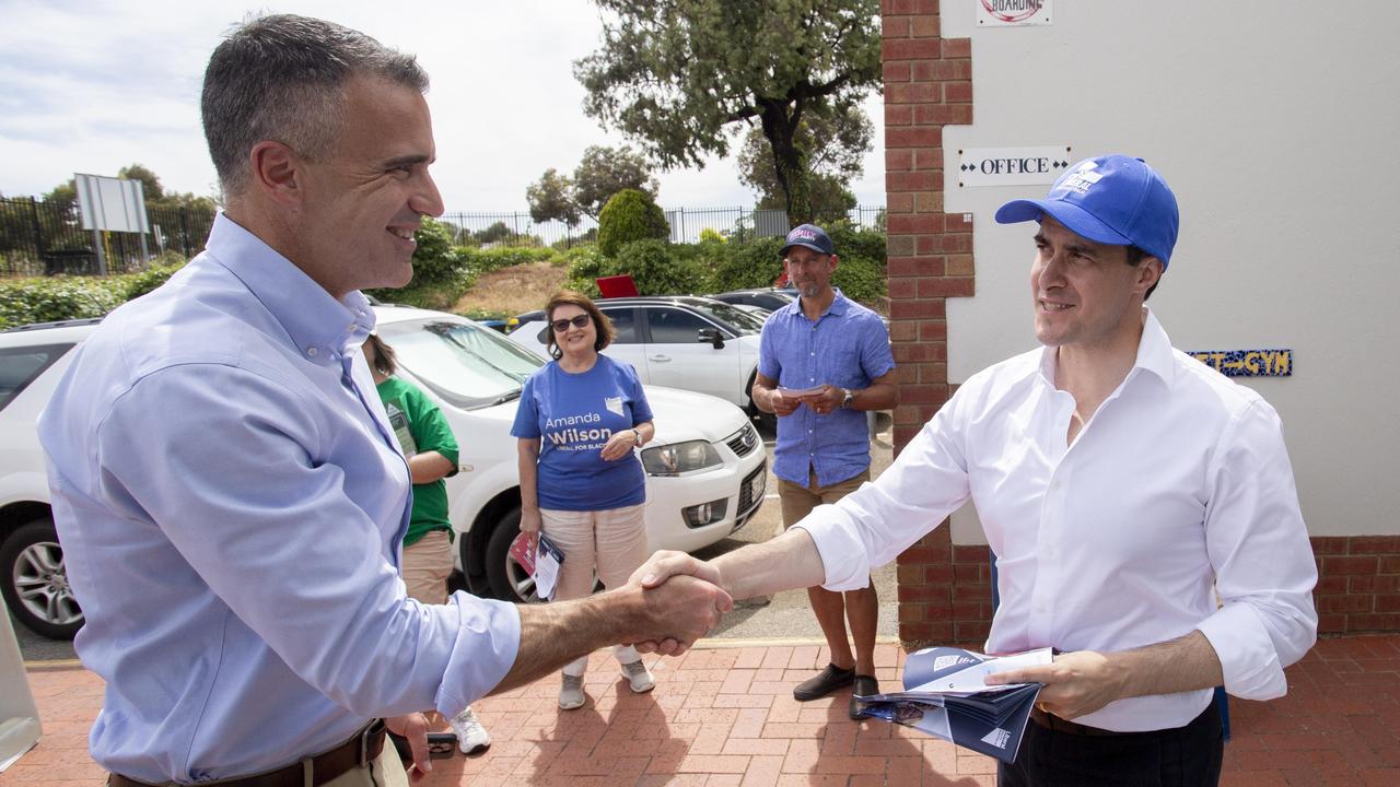 SA Liberal Leader Vincent Tarzia shakes hands with Premier Peter Malinauskas during the Black by-election at Woodend Primary School, Sheidow Park November 16, 2024 Picture: Brett Hartwig