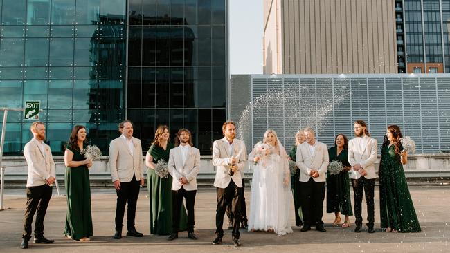 Mr and Mrs Iveson ready to toast their marriage with their bridal party. Picture: Ashlee Joppich Photography