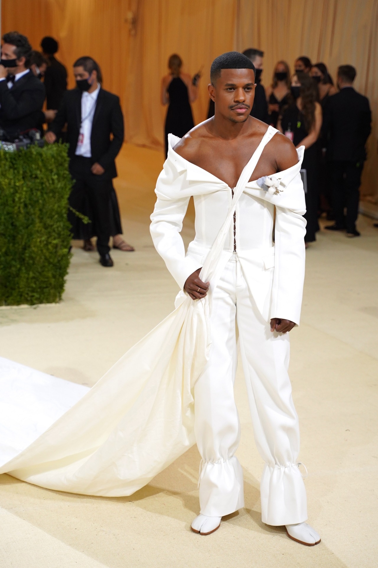 <h2><b>Jeremy Pope in Dion Lee at the 2021 Met Gala</b></h2><p><b><i>Theme:</i></b><i> In America: A Lexicon of Fashion</i></p><p>Some who caught a glimpse of Pope at the 2022 Met Gala would have recalled that the <i>Pose</i> actor had also worn Dion Lee the year prior, at the first chapter of the Metropolitan Museum’s ‘In America’ diptych. 2021 saw Pope turn to Lee for a look confronting the role of slavery in the American cotton industry: an off-shoulder, corseted jumpsuit from the Australian designer, paired with a cotton picking sack by James Flemons, a cotton boutonniere by Denim Tears, and white Tabi boots by Maison Margiela. </p>