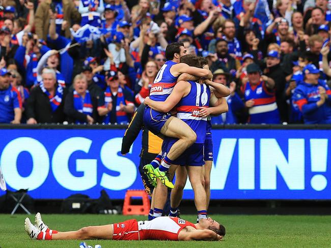 Bulldogs players celebrate their 2016 premiership win. Picture: Toby Zerna