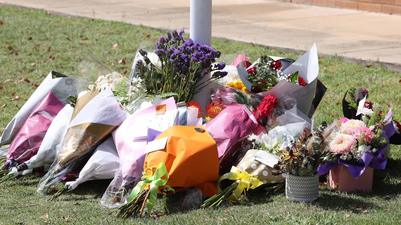 Flowers and cards left at Chinchilla Police Station. Picture: Liam Kidston