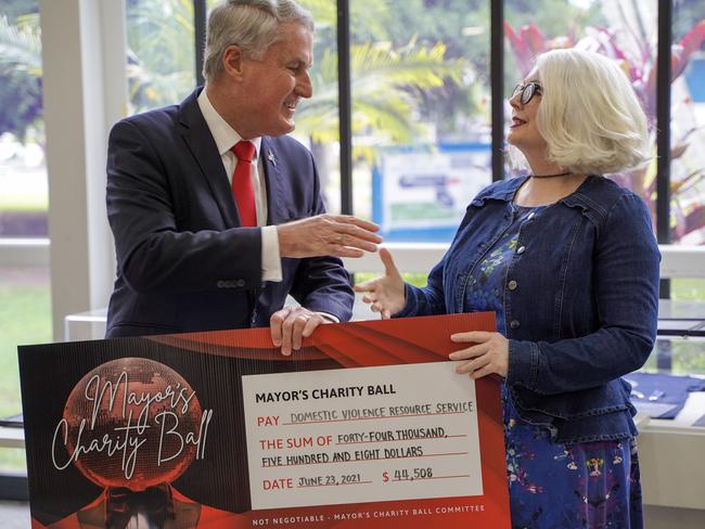 Mackay Mayor Greg Williamson handing a cheque for half of the proceeds from the 2021 Mayor's Charity Ball to Mackay Women's Services executive director Linda-Ann Northey. The ball also fundraised for Heart Kids. Picture: Heidi Petith