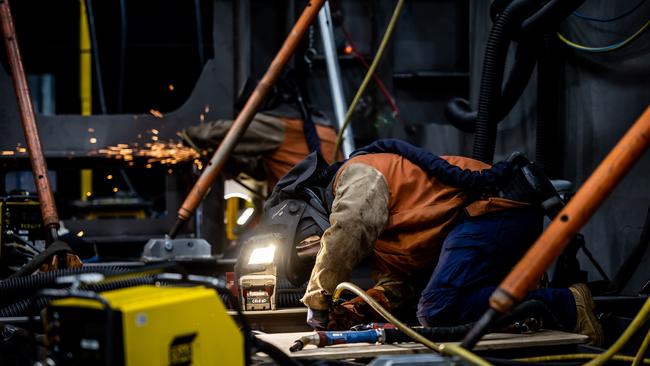 Welders working on the Hunter Class frigates at Osborne. Picture: James Elsby.