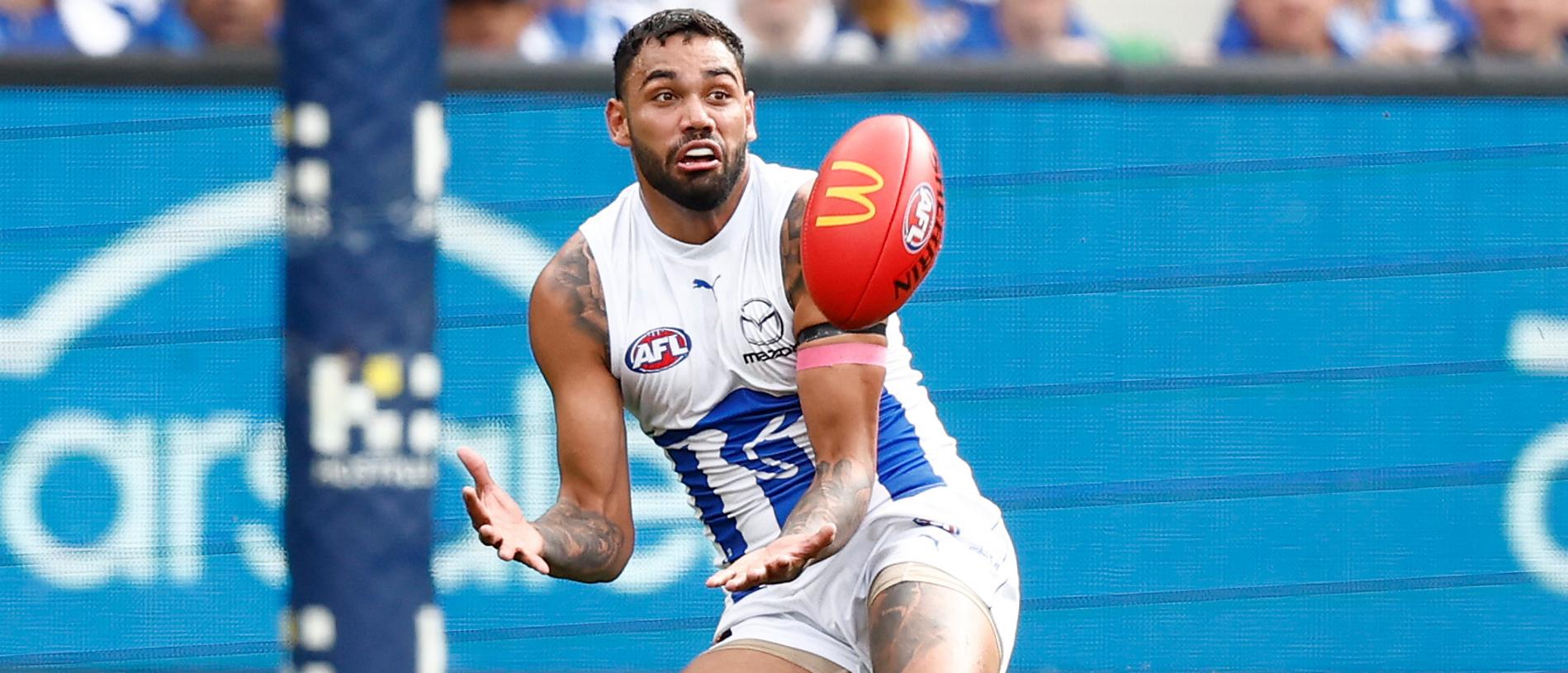 MELBOURNE, AUSTRALIA - AUGUST 19: Tarryn Thomas of the Kangaroos marks the ball during the 2023 AFL Round 23 match between the Richmond Tigers and the North Melbourne Kangaroos at Melbourne Cricket Ground on August 19, 2023 in Melbourne, Australia. (Photo by Michael Willson/AFL Photos via Getty Images)