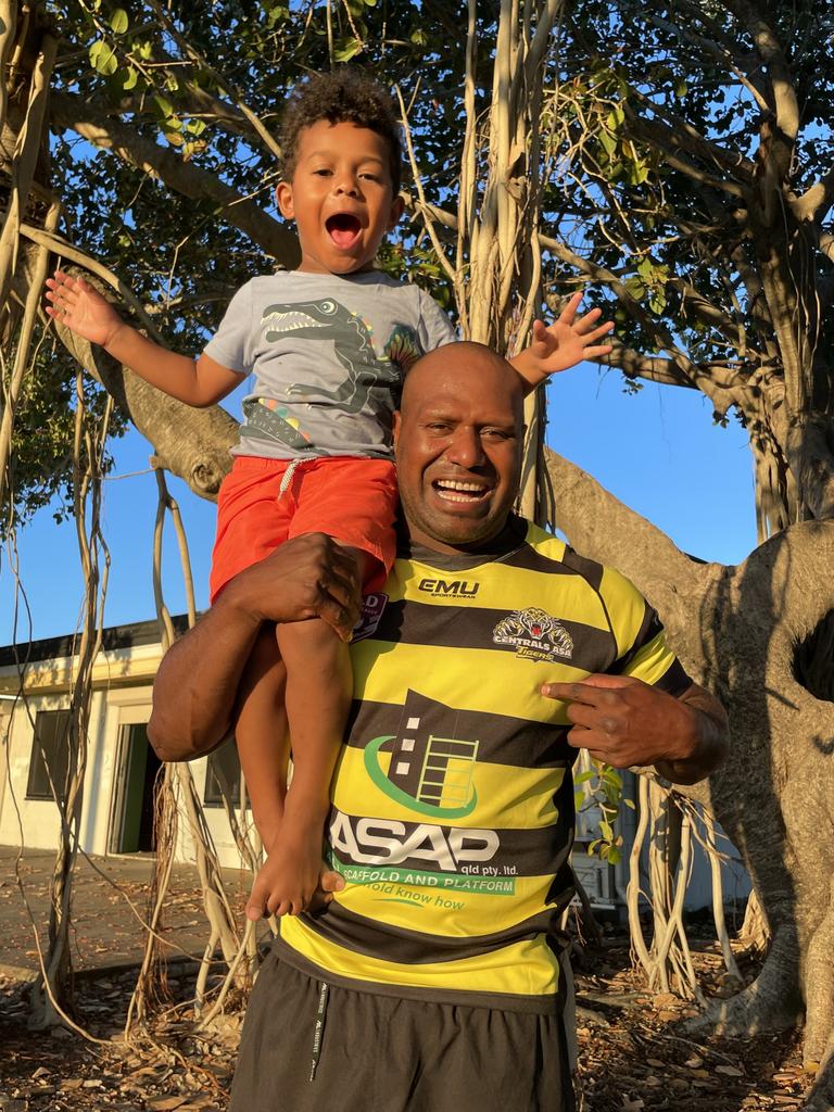 Robert Lui and son Michael Lui, 5, with Centrals Tigers. Picture: Nic Darveniza